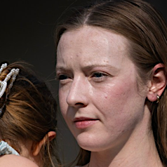 Another square thumbnail of the same photo, but zoomed in on the woman&rsquo;s face.